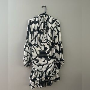 Small black and white pattern mini dress